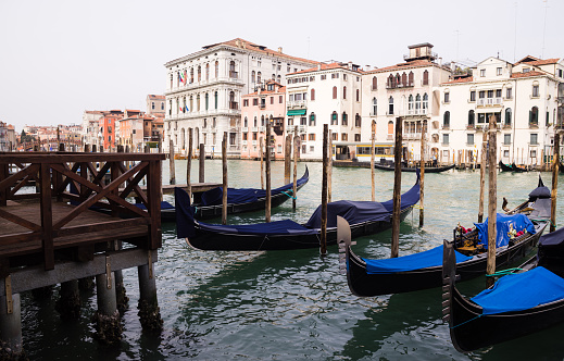 Venice neighborhood canal for gondolas. The gondolas plying the busy Grand Canal and the smaller waterways of Venice are one of the most iconic images in the world.