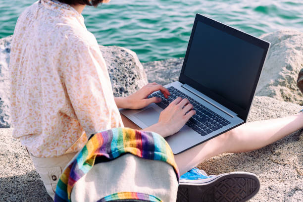 istock unrecognizable young woman working with a laptop 1281725983