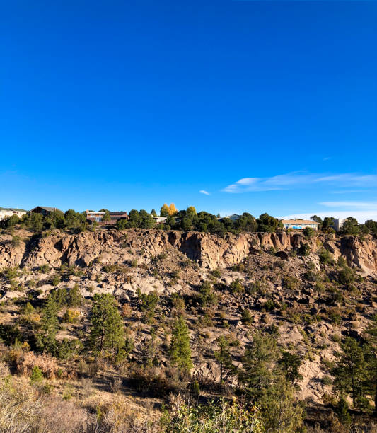 Los Alamos, NM: Sunlit Rocky Cliff/Mesa/Canyon with Homes on Top