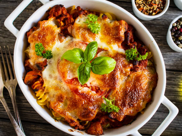 istock Pasta casserole with barbecue chicken breast, cheese and vegetables 1281749069