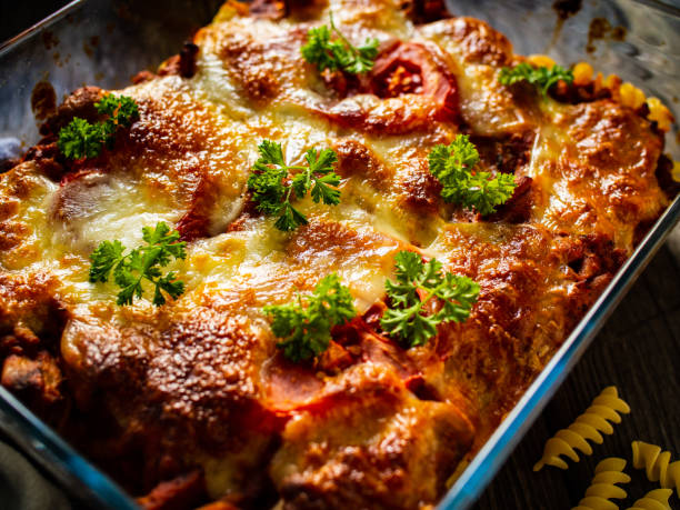 istock Pasta casserole with barbecue chicken breast, cheese and vegetables 1281749082