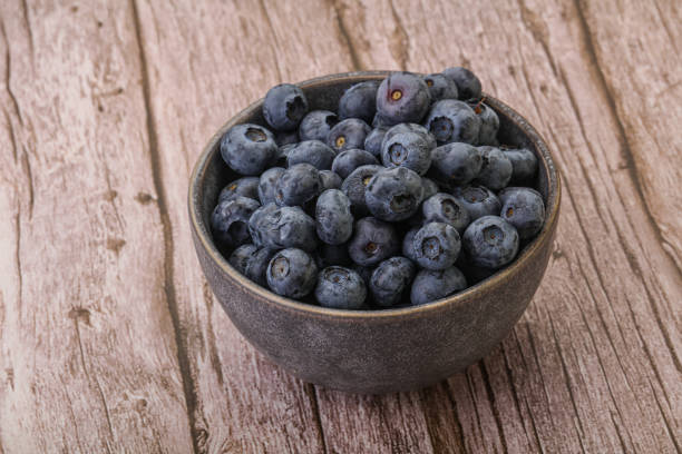 istock Ripe sweet tasty blueberries heap 1281752280