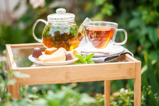 istock Cup of tea  in a garden 1281752613