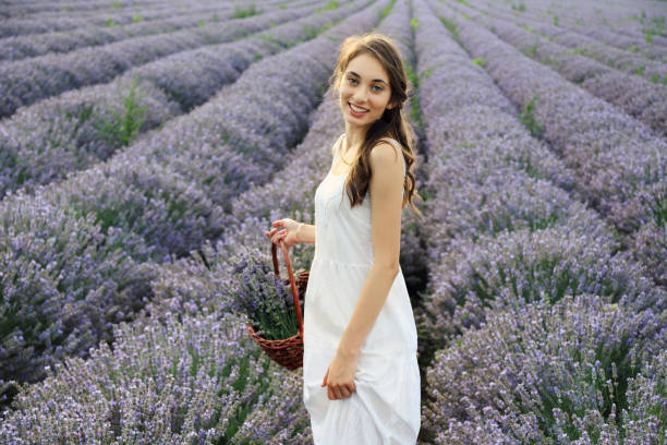 istock Young girl in lavender field 1281754296