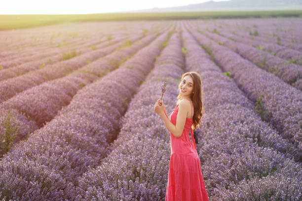istock Young girl in lavender field 1281754304