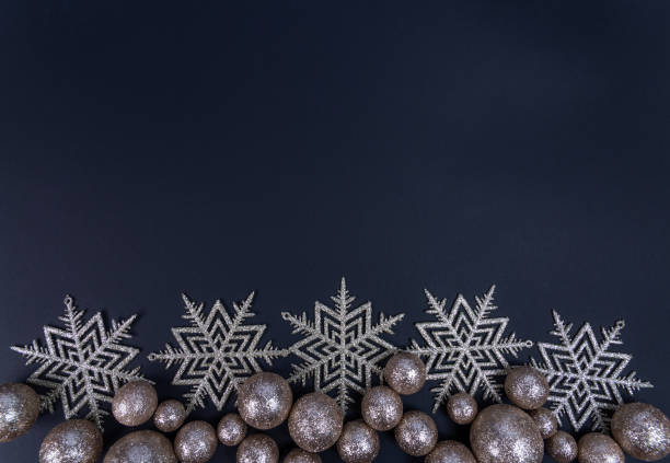 istock Christmas background with silver balls and snowflakes 1281754723