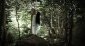 Spooky Japanese ghost woman in a forest