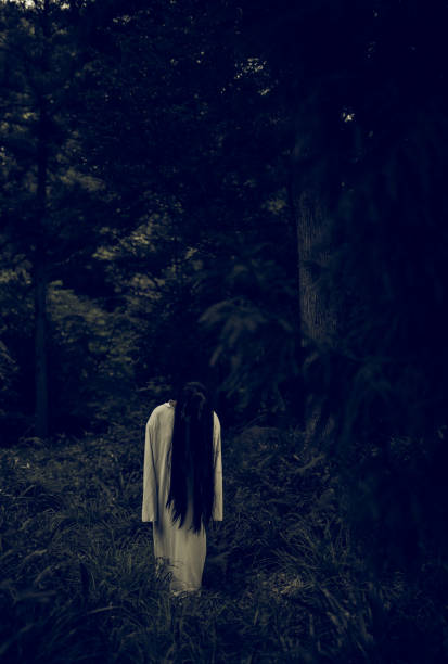 istock Spooky Japanese ghost woman in a forest 1281759273