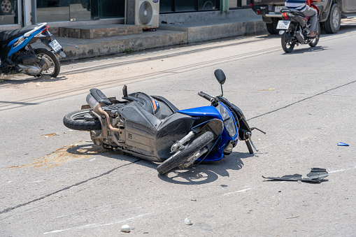 Koh Phangan, Thailand - may 19, 2019 : Motorcycle accident that happened on the road at tropical island Koh Phangan, Thailand . Traffic accident between a motorcycle on street