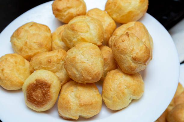 istock homemade profiteroles on a white plate close up 1281761595