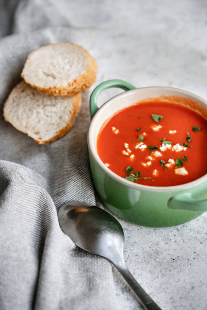 istock Tomato soup in a bowl on the table. 1281762527