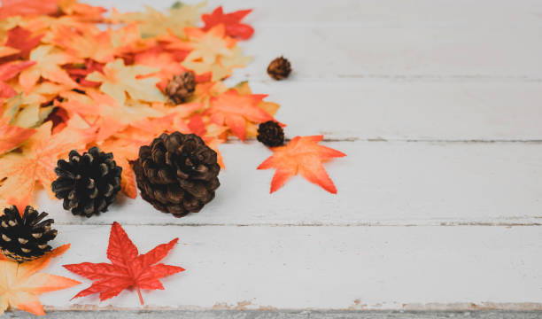 istock Autumn and Fall season background. Fake maple leaf on wood table. Harvest cornucopia and Thanksgiving day concept. 1281766588