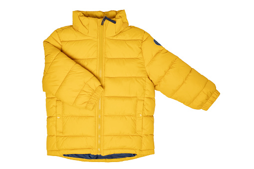 Down jacket for children. Stylish, yellow, warm winter jacket for children with removable hood, isolated on a white background. Winter fashion.