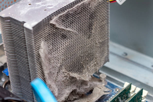 istock Dusty old cooler radiator on a computer service. Maintenance repair. 1281768636