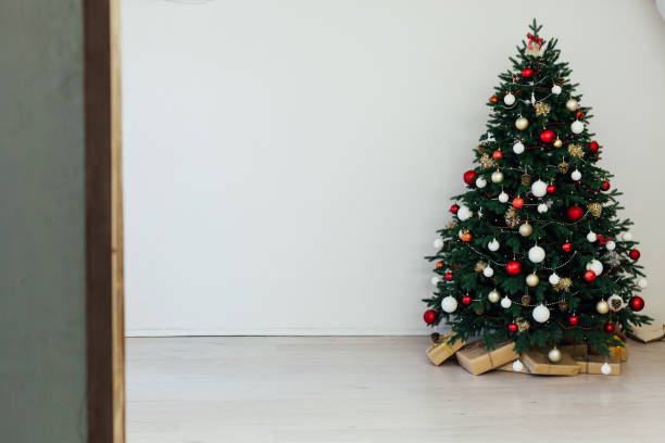 istock Christmas tree with gift decor for new year interior holiday card 1281769902