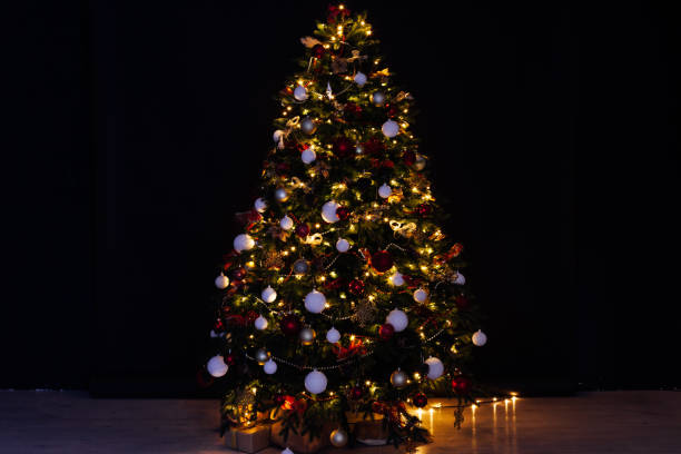 istock Christmas tree shines lights garlands New Year's Eve light 1281771478