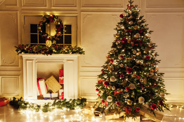istock Christmas tree shines lights garlands New Year's Night warm light 1281771707