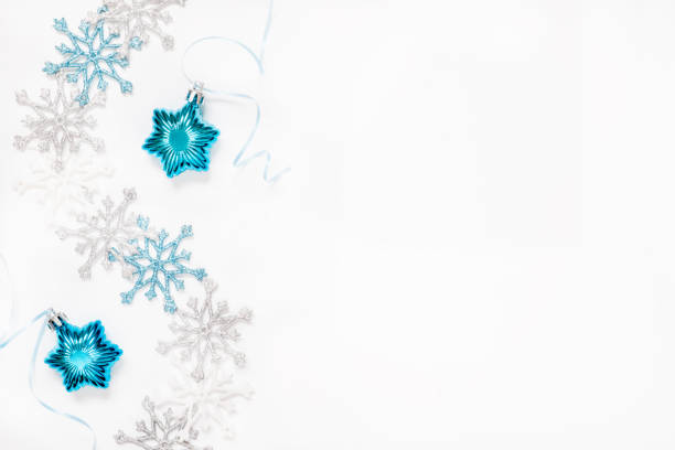 istock Christmas or New Year's composition 2021. Beautiful xmas blue and silver decorations on a white background and copy space. Flat lay 1281772251