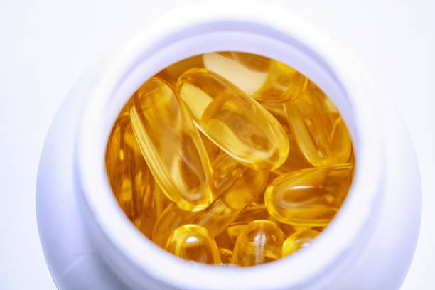 istock yellow medicine pills in the white bottle 1281774046
