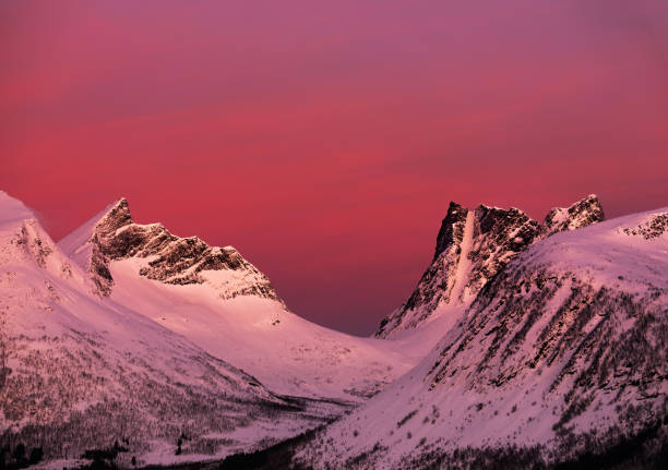 Ersfjord view of the snowcapped mountain peak in Senja, Norway.