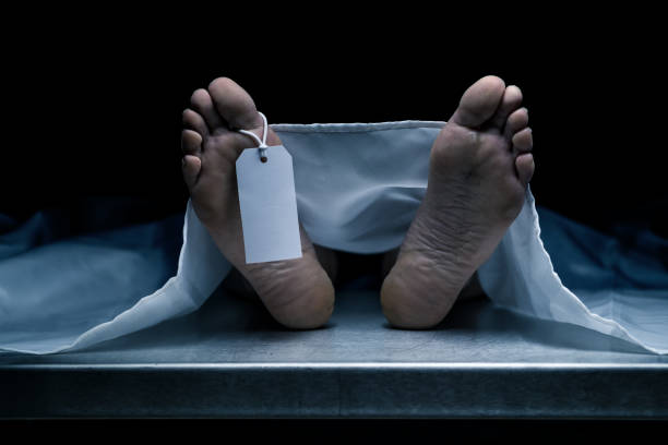 Victim of COVID-19 Dead body with an blank tag. Coronavirus victim. morgue stock pictures, royalty-free photos & images