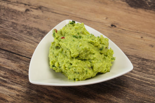 istock Avocado guacamole sauce with chili pepper 1281789291