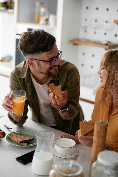 istock Young couple making sandwich at home 1281789936