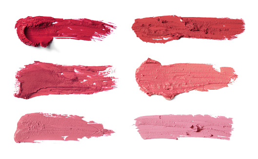 Set of different various lipstick and nail polish strokes on white background. (Clipping Path)