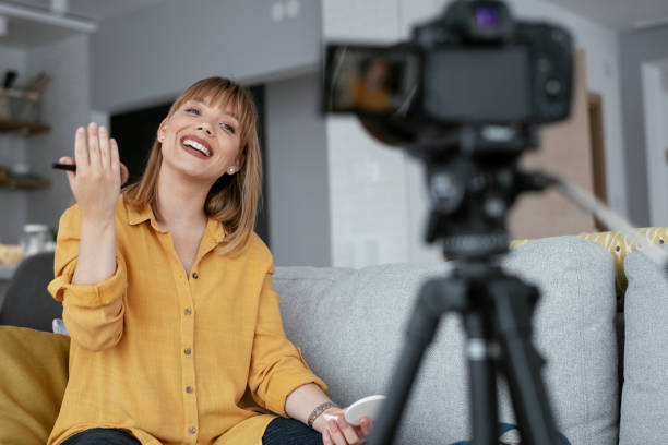 istock Young beautiful woman recording make up tutorial to share on social media 1281791152