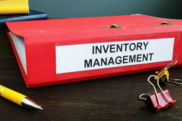 istock Folder with papers about Inventory Management and pen. 1281795639