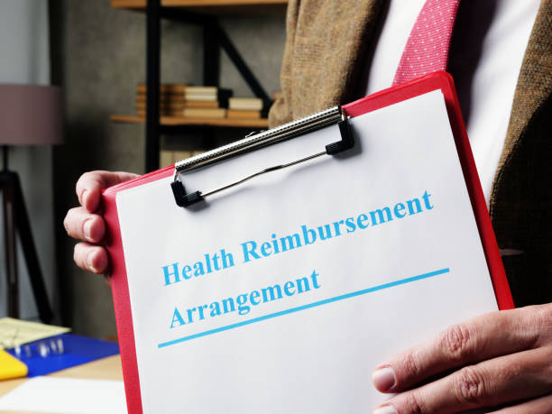 istock Man proposes Health Reimbursement Arrangement HRA documents. 1281795726