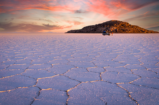 Spectacular sunrise over the world's largest salt lake Salar de Uyuni. Southwestern Bolivia is well-known for dramatic landscapes, lagunas, geysers and deserts.