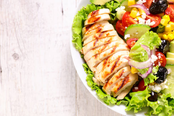 istock grilled chicken fillet with vegetable salad- buddha bowl 1281798452
