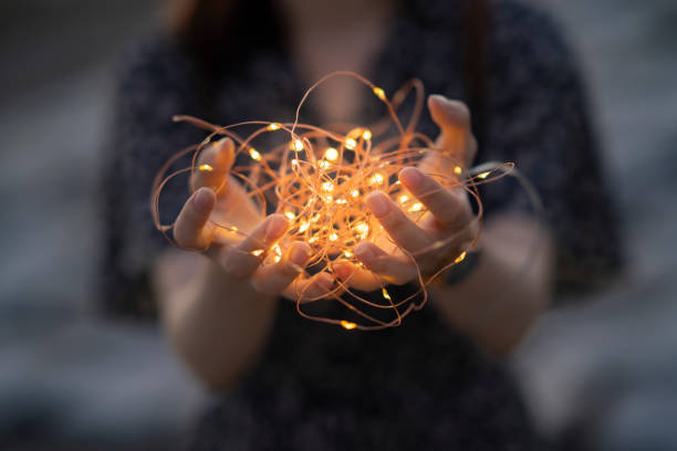 istock Young woman with illumination light 1281803512