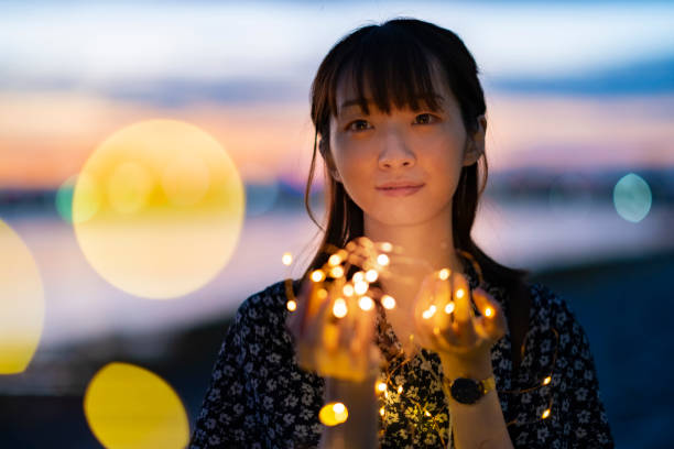 istock young woman staring at the illumination lights 1281803875