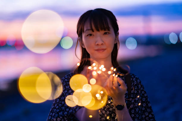 istock young woman staring at the illumination lights 1281803904