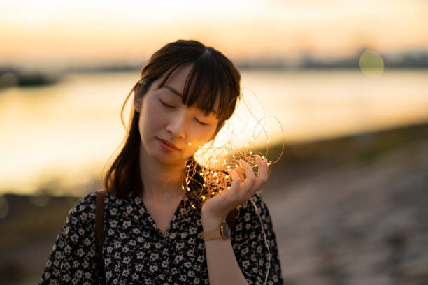 istock illumination lights closer to her ear 1281804566