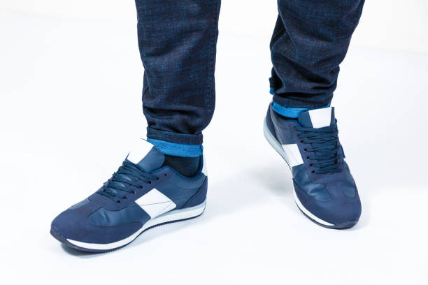 istock Man blue sport sneakers isolated 1281805562