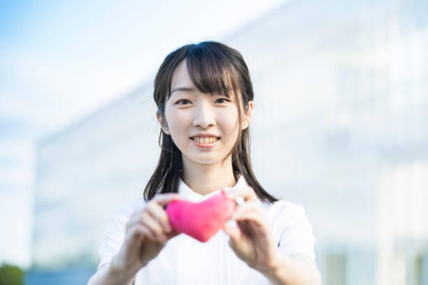 istock A woman in a white coat 1281806418