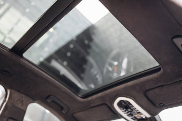 istock Panoramic glass sun roof in the car 1281807700
