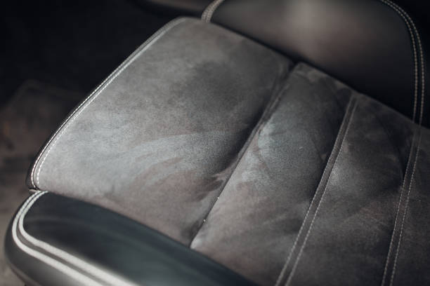 istock Grey leather car seat close up 1281807751