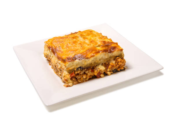 Greek Moussaka in dish isolated on white background. stock photo