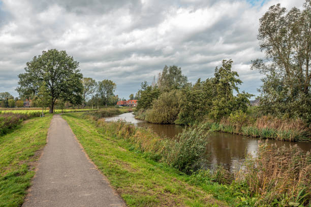 istock Picturesque Dutch autumn landscape with perspective 1281810378