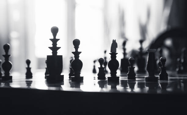 istock Shiny retro chess board with chessmen. Close-up 1281814636