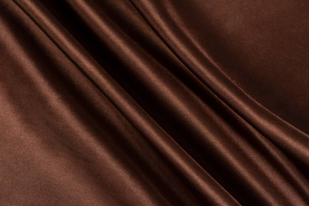 istock Abstract chocolate background, brown abstract satin silk 1281815835