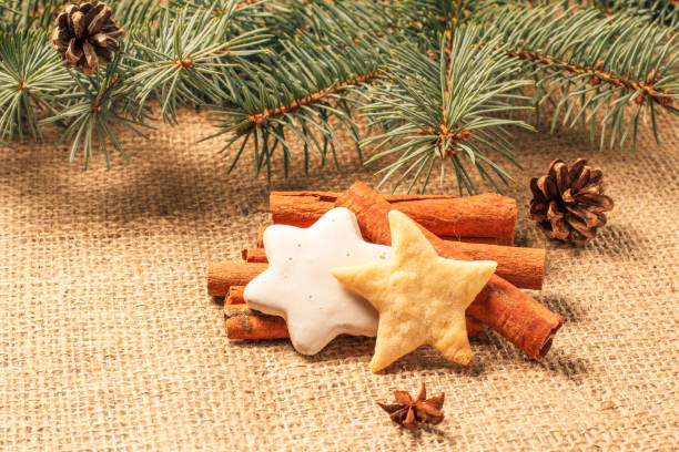 istock Christmas gingerbread cookie on sackcloth with cinnamon and star anis 1281816601
