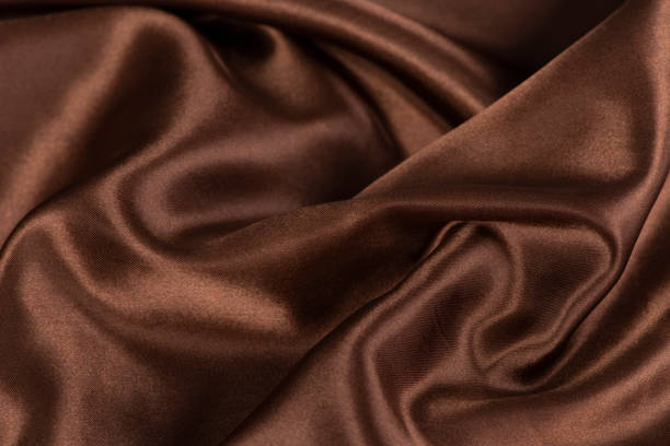 istock Abstract chocolate background, brown abstract satin silk 1281816641
