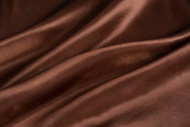 istock Abstract chocolate background, brown abstract satin silk 1281816900
