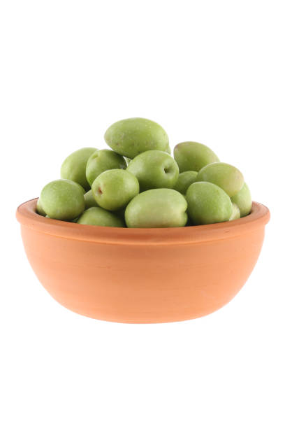 istock Green olives with leaves set isolated on white background as package design element 1281818392