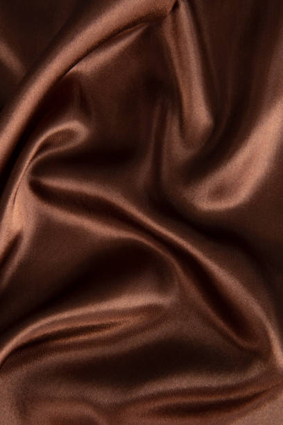 istock Abstract chocolate background, brown abstract satin silk 1281819150